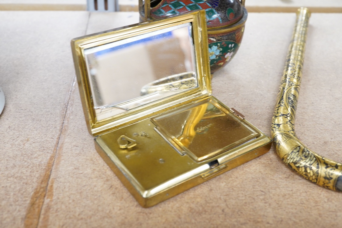 A Japanese damascened iron parasol handle, a cloisonné enamel koro and Komai style mirrored musical compact, largest 24cm in length